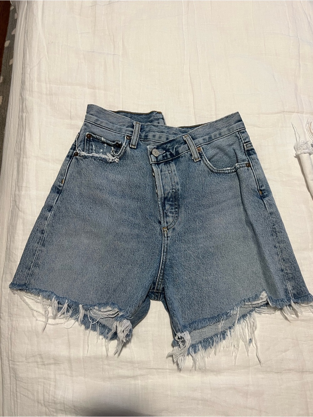 Agolde Distressed High-Waist Frayed Hem Jean Shorts in Light Blue